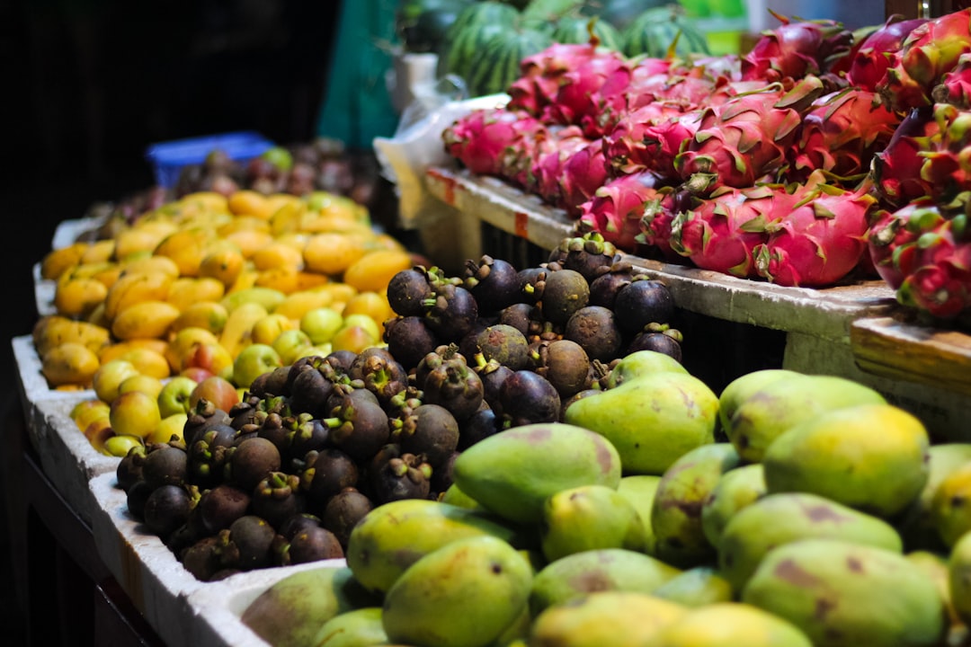 Mangosteen - a variety of fruits are on display at a market