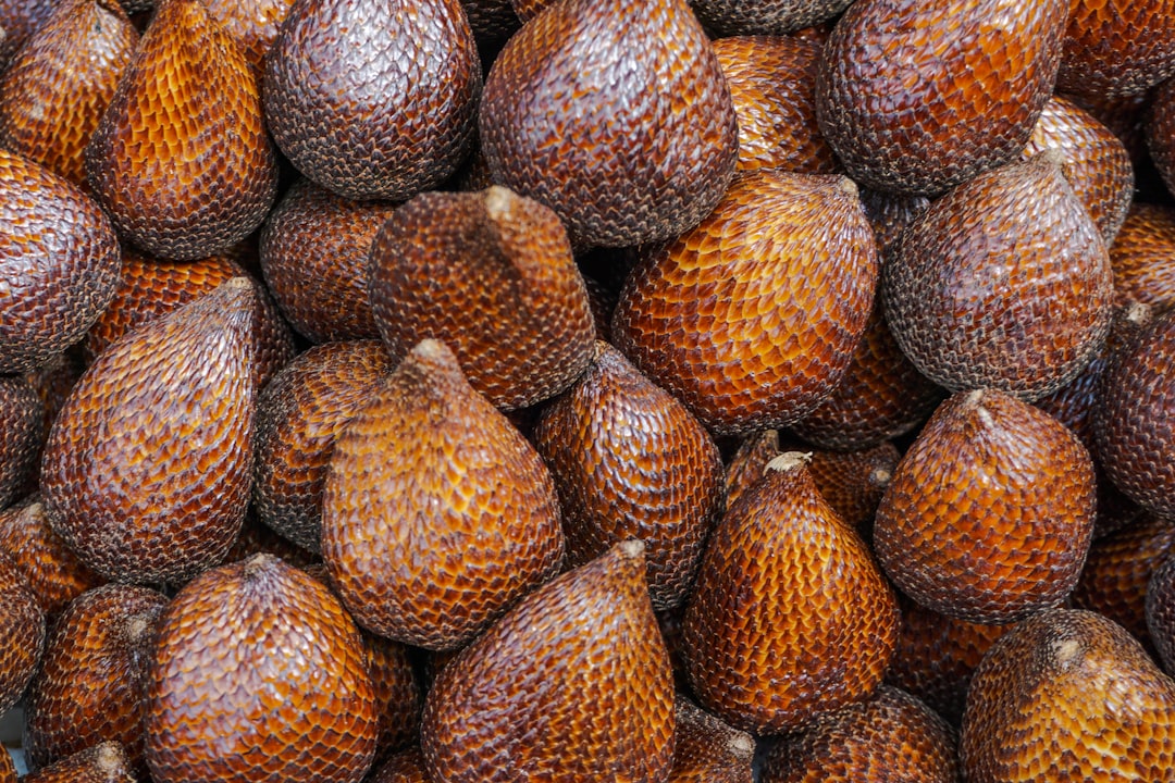Salak - A large pile of fruit sitting on top of a table