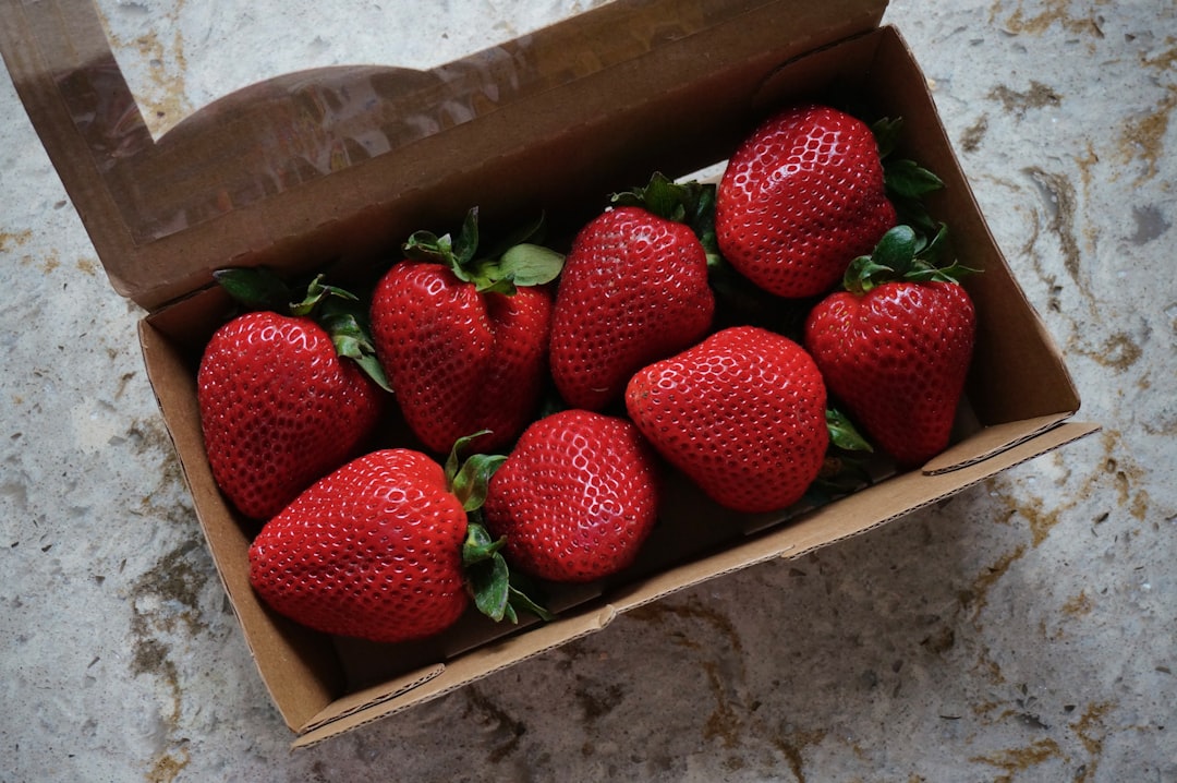 Strawberry - a box filled with lots of ripe strawberries