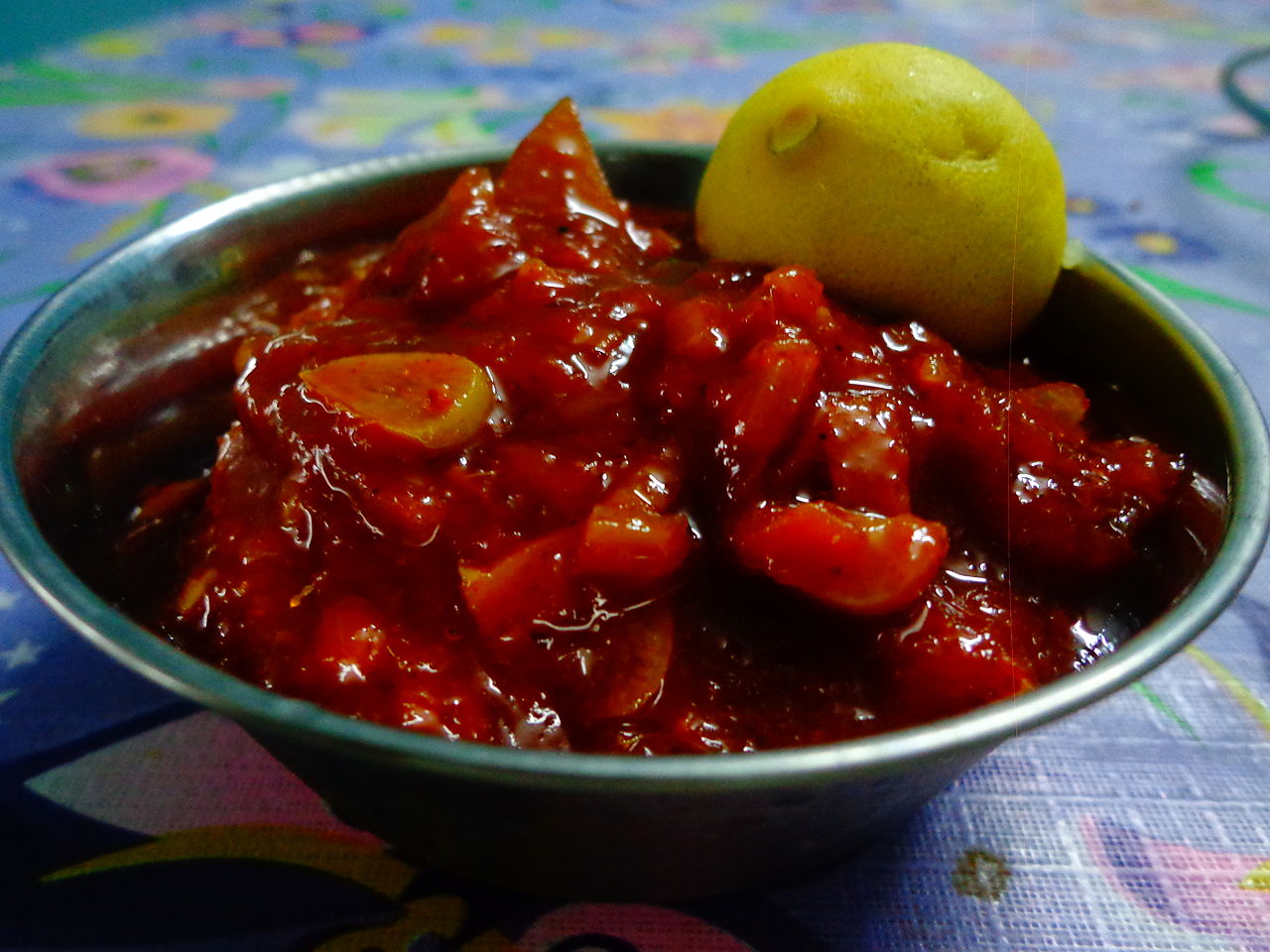 Sweet Lime - Sweet lemon pickle enhances the glory of south indian meals with its sour, hot and sweet flaour. Garlics added add to the flavor of the pickle.