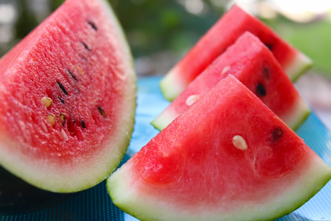 Watermelon - sliced watermelon on white table